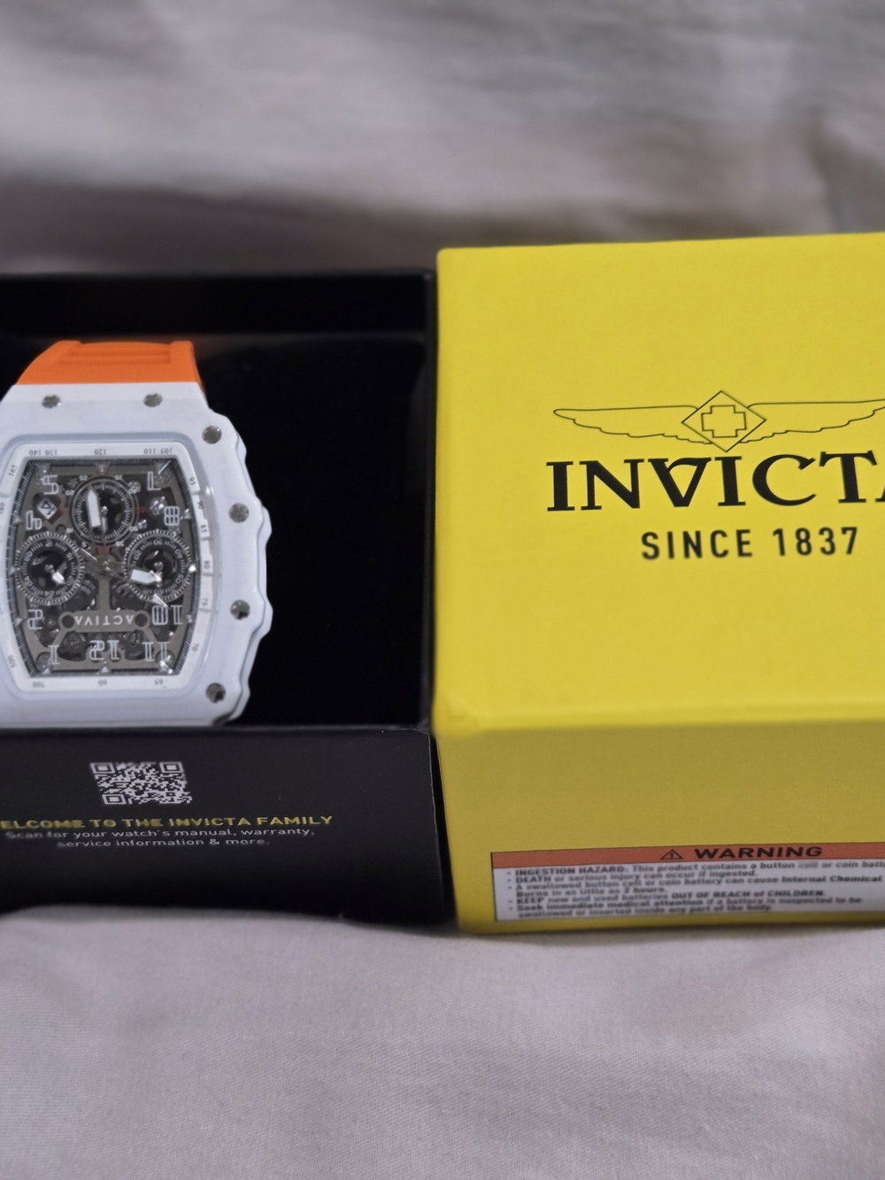 Invicta White Case Orange Strap Skeleton Dial Sport Watch